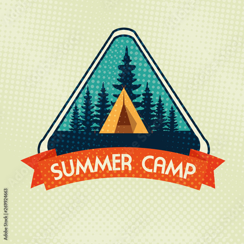 label of camp with pines trees and ribbon