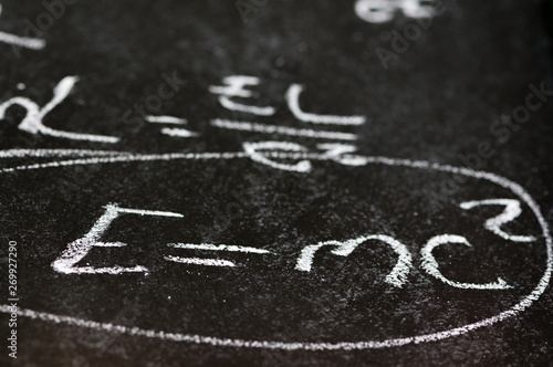 Mathematical derivation of E=mc^2 on a blackboard