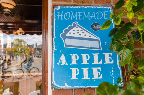 Sign for homemade apple pie in the window of a cafe