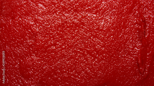 The texture of tomato paste.Ketchup background.Tomato sauce.