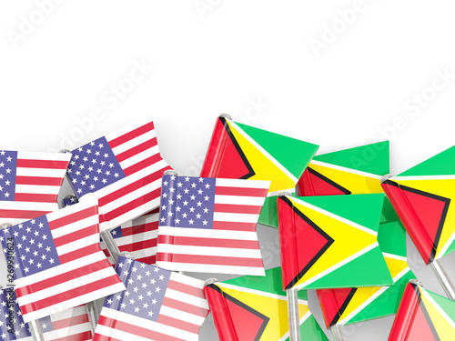 Pins with flags of United States and guyana isolated on white
