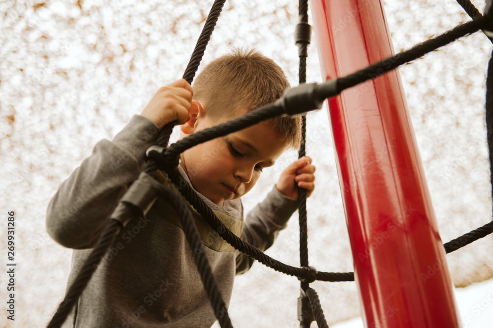 Obraz premium A little boy in the playroom