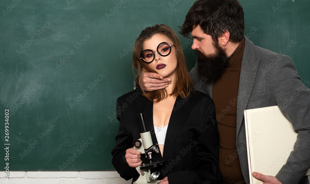 Lets Talk Sex. Couple of man and woman in classroom. Library romance.  Office romance. Lesson and sex education in high school. Sexy teacher with  student romance. Stock Photo | Adobe Stock