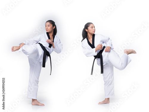 Master Black Belt TaeKwonDo instructor Teacher show traditional Fighting Act pose and warm up in White former dress, studio lighting white background isolated, copy space, motion blur on foots hands