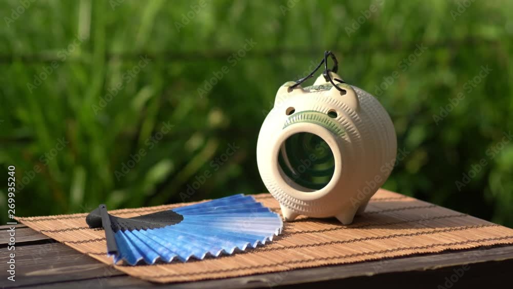 日本の夏の風物詩 蚊取り豚と線香の煙 StockVideo Adobe Stock