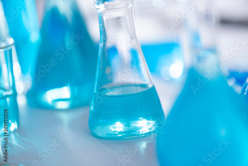 Chemical laboratory equipment Glassware for research and blue matter