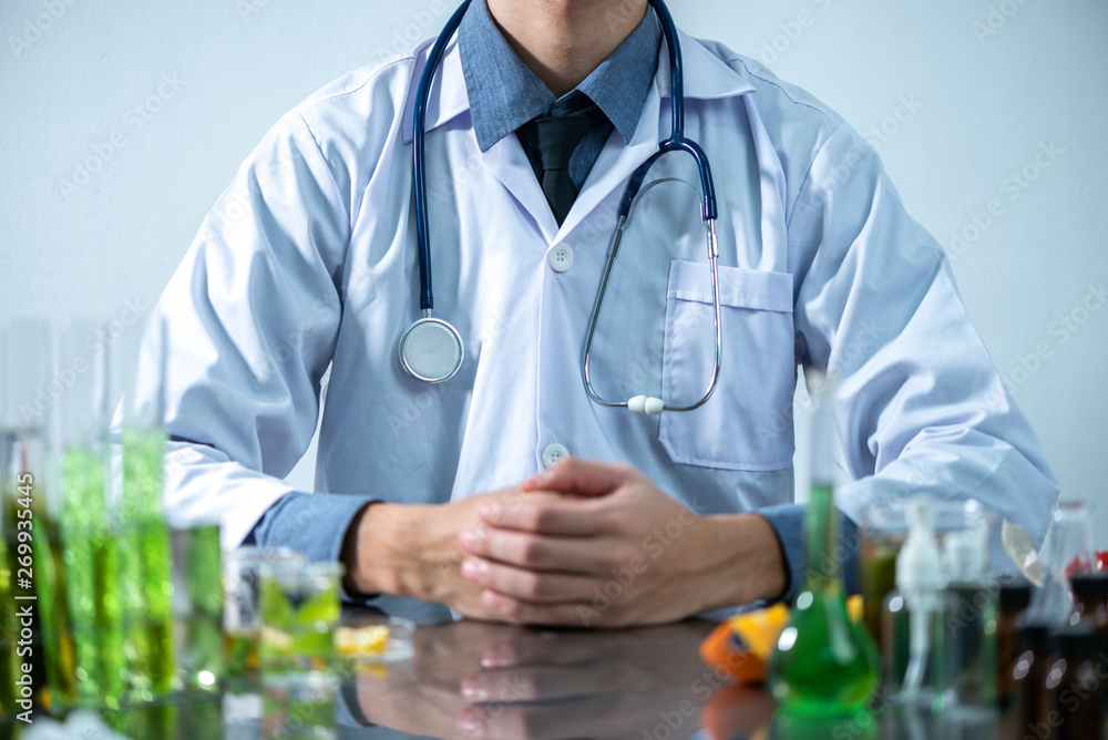 The scientist test the natural product extract, oil and biofuel solution, in the chemistry laboratory. The scientist test the natural product extract, oil and biofuel solution, in the chemistry laboratory.