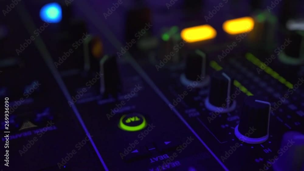 Close up DJ mixer player and sound console for house music party. DJ