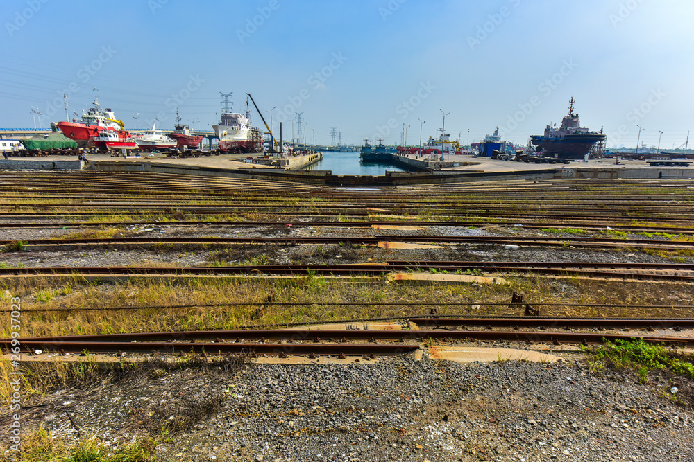 A shipyard used to tow mechanical equipment and track that need to be repaired for ships going ashore - September 1, 2018 in luannan county, tangshan city, hebei province, China