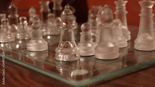 Bishop atacking tower in a chess play photo