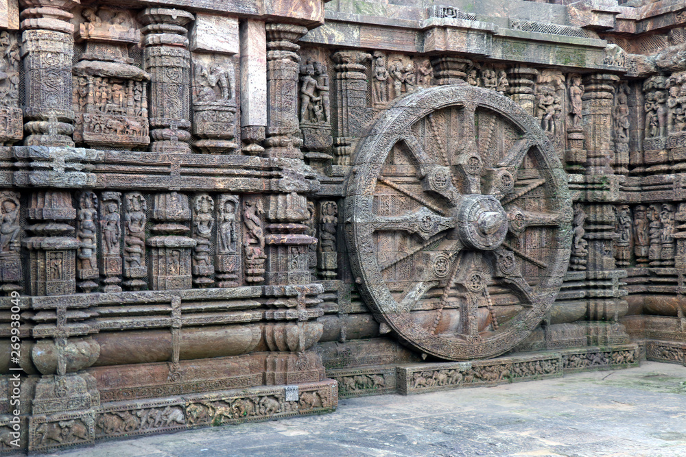 Obraz premium Ancient chariot Wheel, Konark Sun Temple, Orissa. Konark Sun Temple is a 13th-century CE sun temple at Konark about 35 km northeast from Puri on the coastline of Odisha, India.