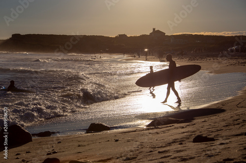 Surfer at sunset in Montauk