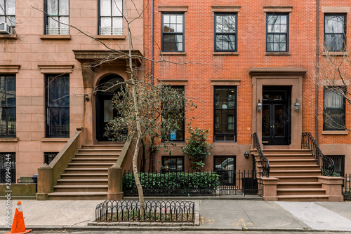 Brownstone facades & row houses in an iconic neighborhood of Brooklyn Heights in New York City