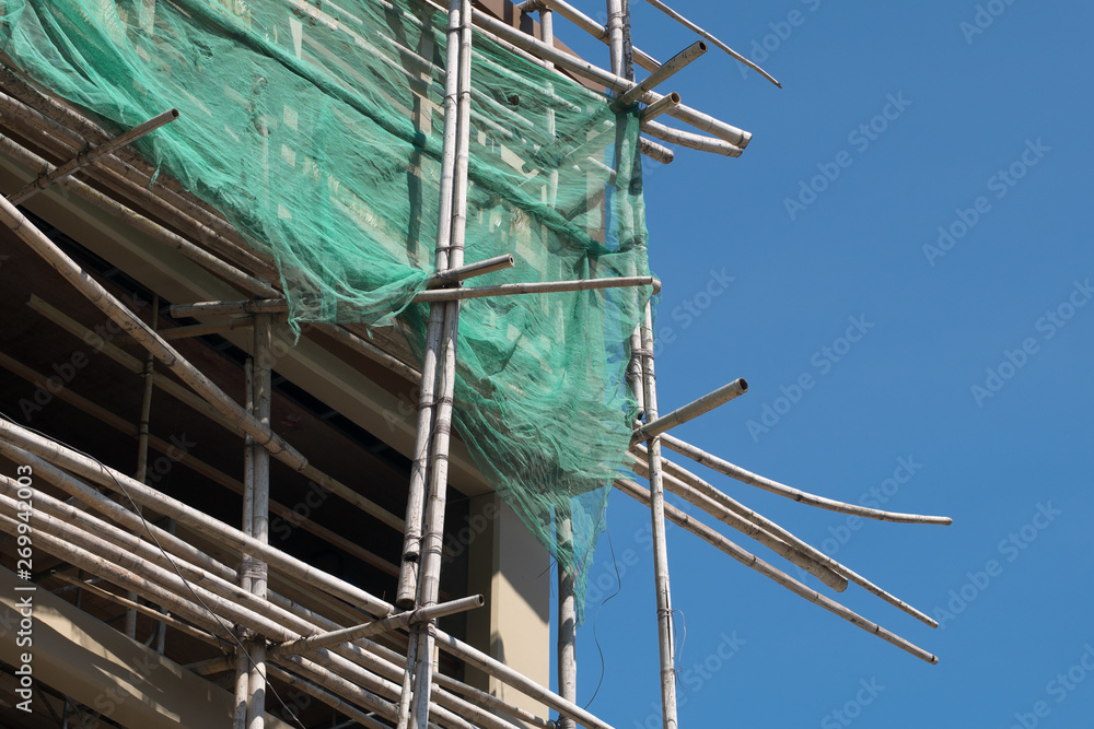 Bamboo scaffoldings of the construction site Bamboo scaffoldings of the construction site