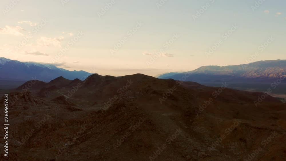 Sunset at the Alabama Hills near Lone Pine, California. With in the background the tallest mountain Mount Whitney. Aerial shot. Sunset at the Alabama Hills near Lone Pine, California. With in the background the tallest mountain Mount Whitney. Aerial shot.