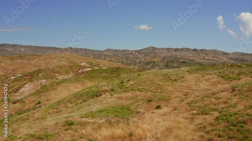 The hills next to the I-15 near Phelan in California. Aerial shot. photo