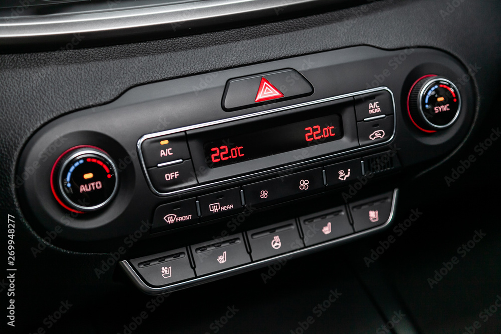 Fototapeta premium Car media control knob with function buttons, player, radio in car