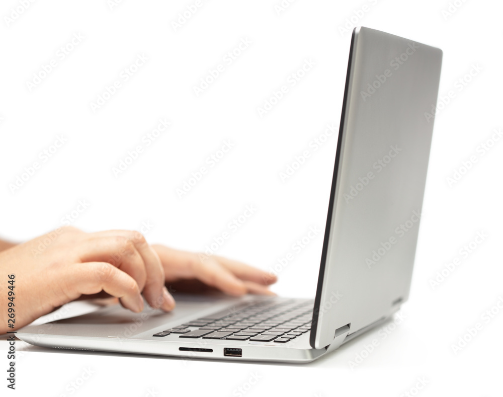 hands typing on modern laptop isolated on white background hands typing on modern laptop isolated on white background