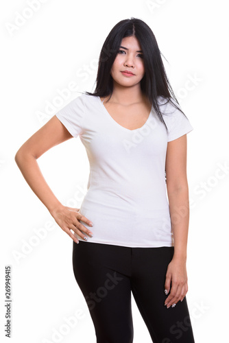 Studio Portrait Of Young Asian Woman Isolated Against White Background © Ranta Images