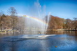 Water fountain in a pond with rainbow at Slottsskogen park