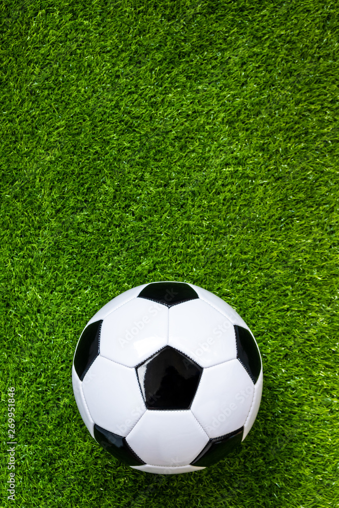 top view of soccer ball on artificial grass feild background
