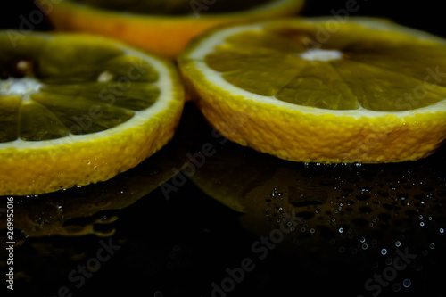 lemon on black background, yellow, black background