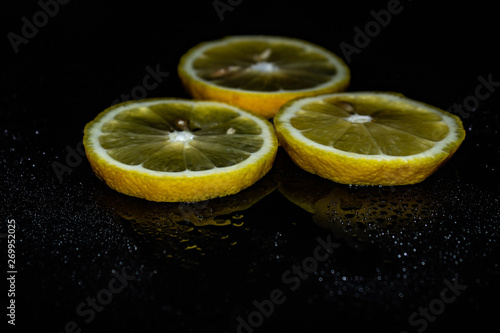 lemon on black background, yellow, black background