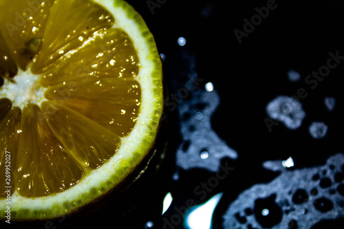 lemon on black background, yellow, black background
