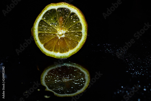 lemon on black background, yellow, black background