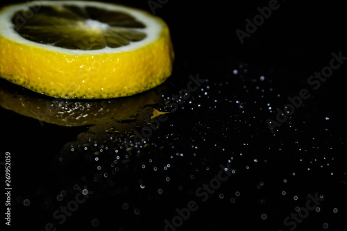 lemon on black background, yellow, black background