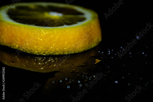 lemon on black background, yellow, black background