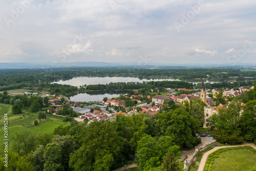 Aerial view to Hluboka nad Vltavou with pond Municky, Czech landscape