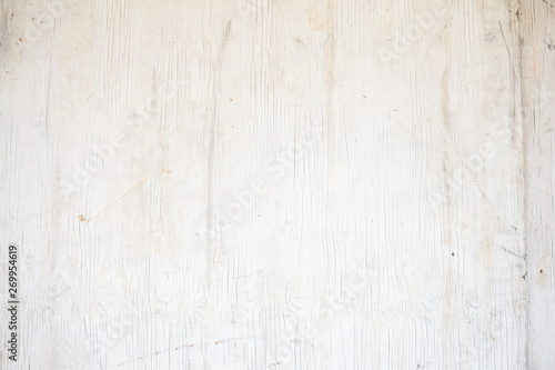 A background of a white painted wood board