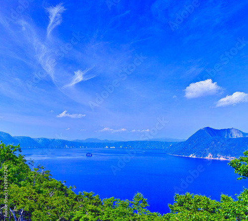 初夏の北海道、摩周第一展望台からの見る白樺林と摩周ブルーに輝く摩周湖