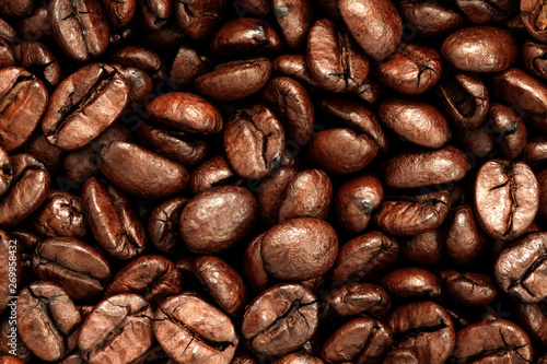 Macro photo of roasted coffee beans background © Mateusz Liberra