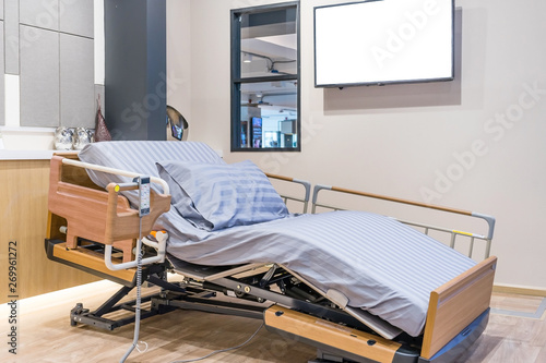 Slika na platnu Electrical adjustable patient bed in hospital room