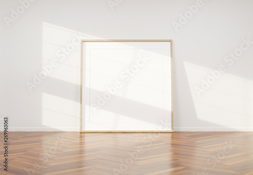 Wooden frame leaning in bright white interior with wooden floor mockup 3D rendering photo