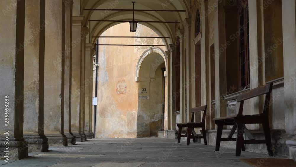 Long Porticos Chapel with windows at the Sacred Mountain of Varallo, a christian devotional complex, a unesco world heritage si in Italy. Zoom in 4k footage Long Porticos Chapel with windows at the Sacred Mountain of Varallo, a christian devotional complex, a unesco world heritage si in Italy. Zoom in 4k footage