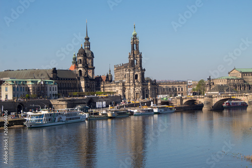 Dresden streets with beautiful architectural masterpieces in the Baroque and Art Nouveau style on a sunny Easter day.