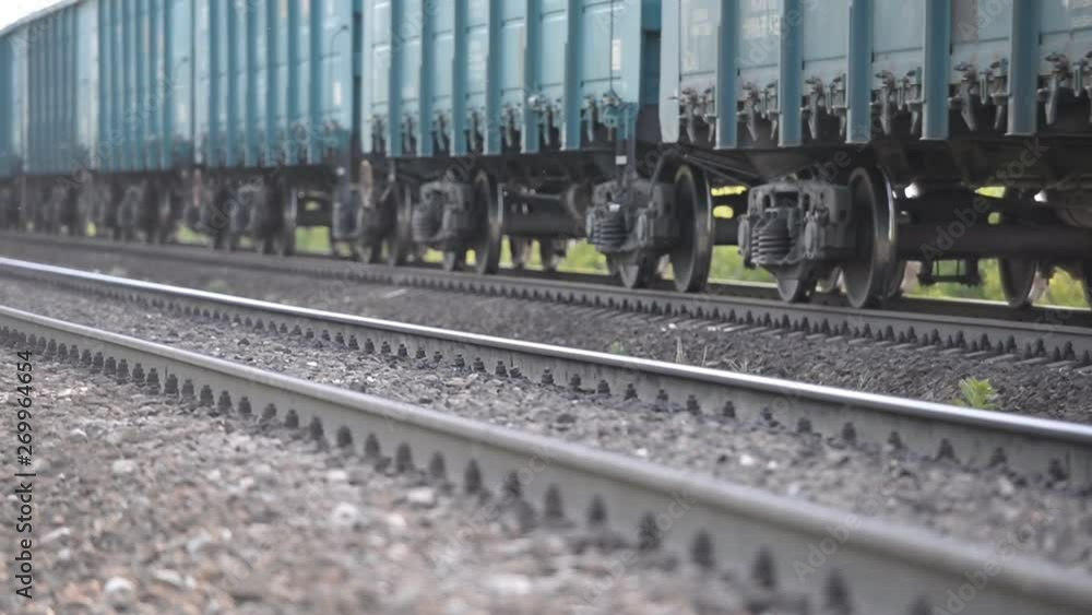 Close-up of a wheeled pair (wheeled cart) of a freight railway train Close-up of a wheeled pair (wheeled cart) of a freight railway train