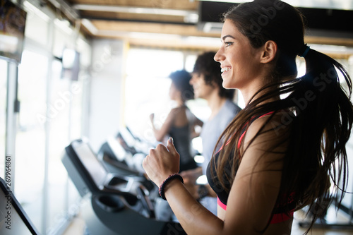 Fit people running in machi...