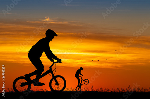 Wallpaper Mural bike trial silhouette at sunset Torontodigital.ca