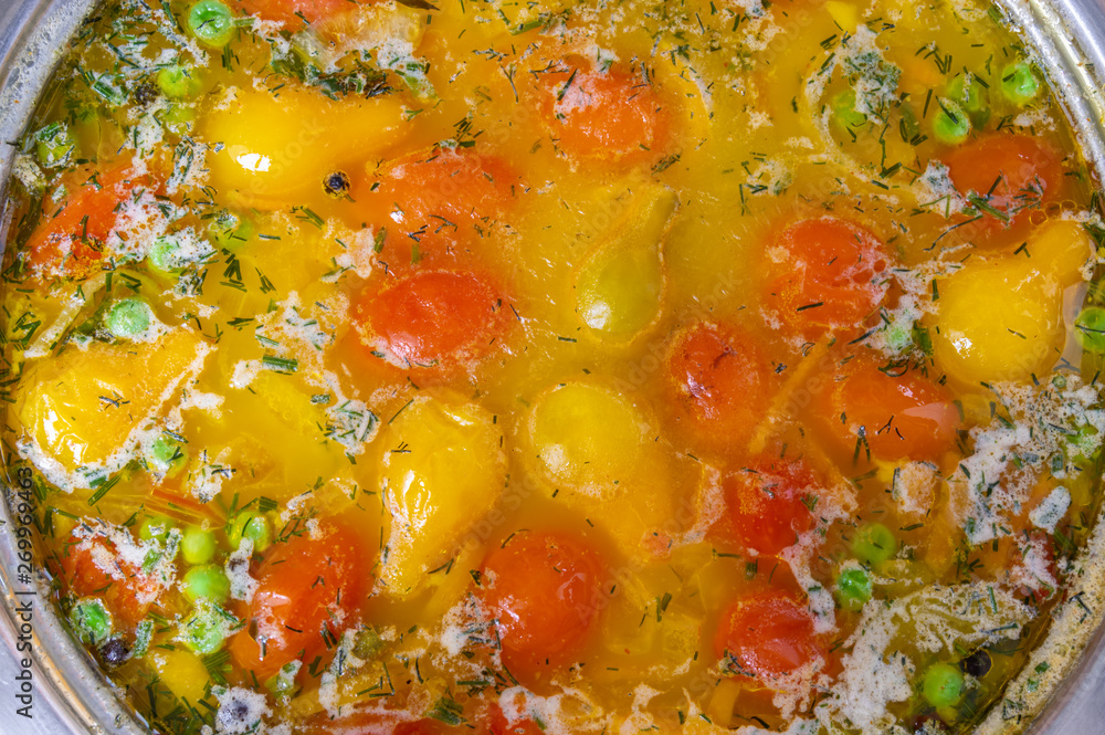 Top view on a pan full of fresh tomato soup Top view on a pan full of fresh tomato soup