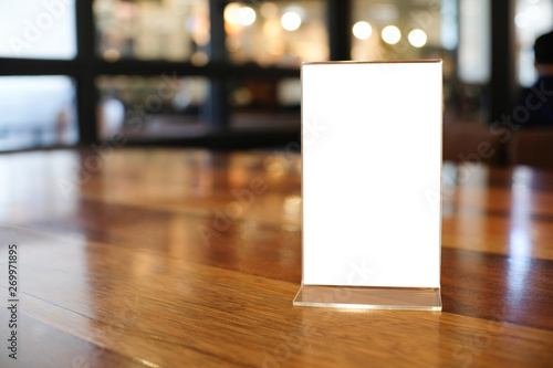 Wallpaper Mural Menu frame space for text marketing promotion standing on wood table in Bar restaurant cafeใ Torontodigital.ca