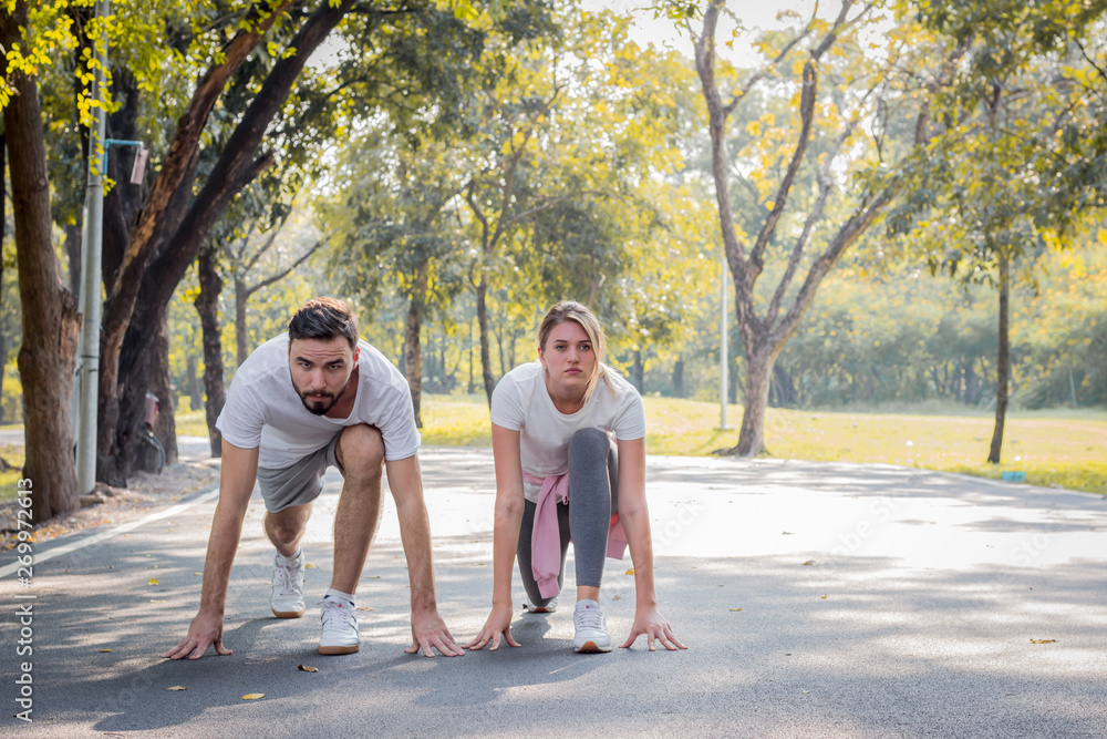 Couple are preparing to exercise. Couple are preparing to exercise.