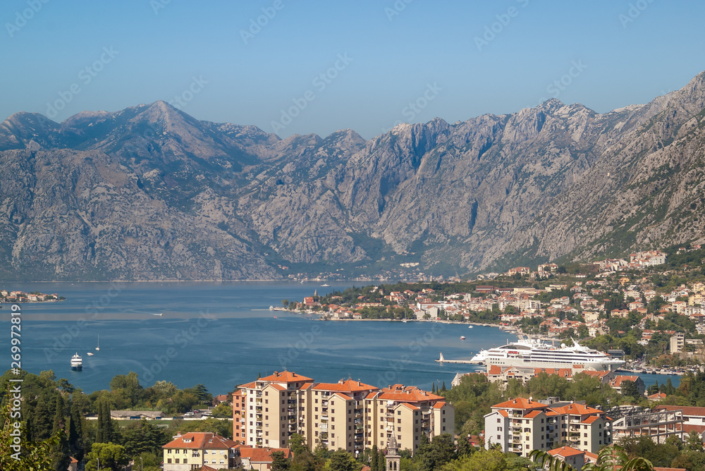 Panoramic view from the top of the beautiful bay of Kotor and the scenic mountains in the background. 