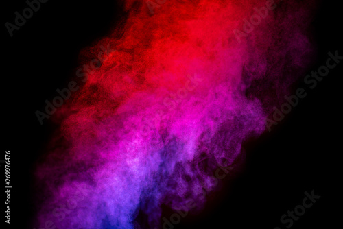 Bright red and magenta smoke isolated on black background