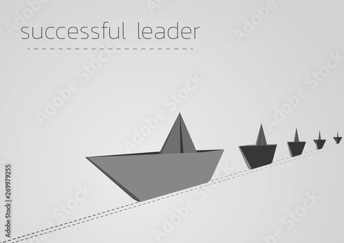 successful leader with a folded paper boat