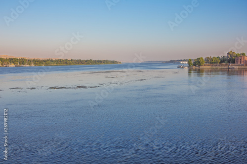 The Nile with Aswan in a distance, seen from the left bank photo