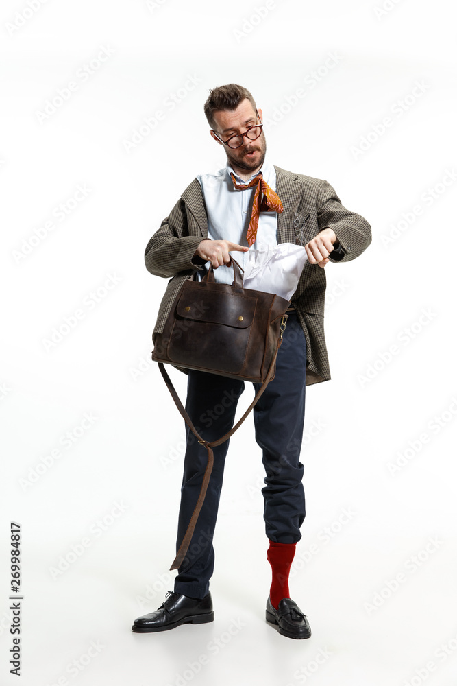 Has no time for morning. Young man comes to work rumpled and untidy because it's deadline. He has no time for clothing. Concept of office worker's troubles, business, problems and stress. Has no time for morning. Young man comes to work rumpled and untidy because it's deadline. He has no time for clothing. Concept of office worker's troubles, business, problems and stress.